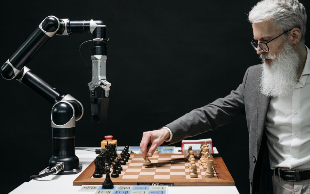 Robot and man playing chess on table.